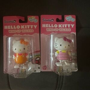 Hello kitty wind up walkers two total. Rare hard to find no longer sold